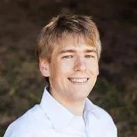 Travis May