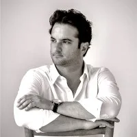 Adam J. Simons